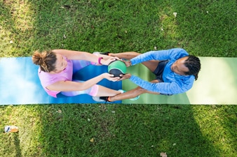 Two people exercise together