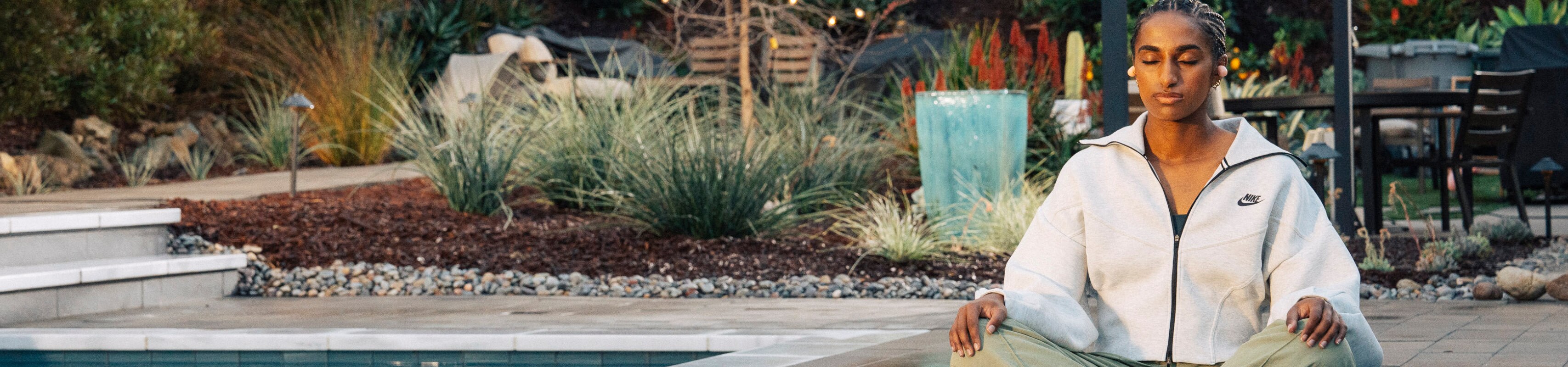 Soccer player Naomi Girma meditating outdoors