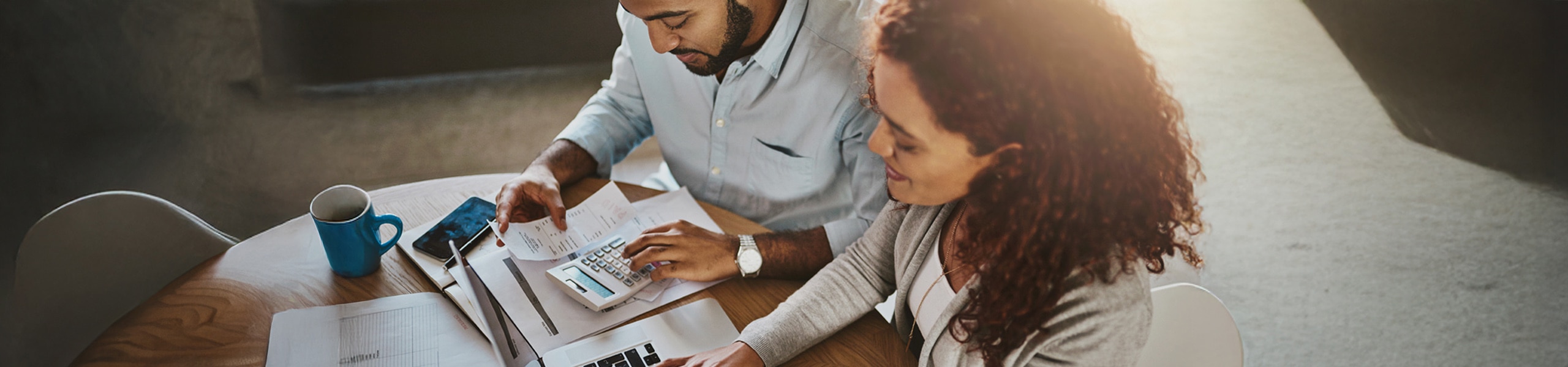 Couple working together at a table