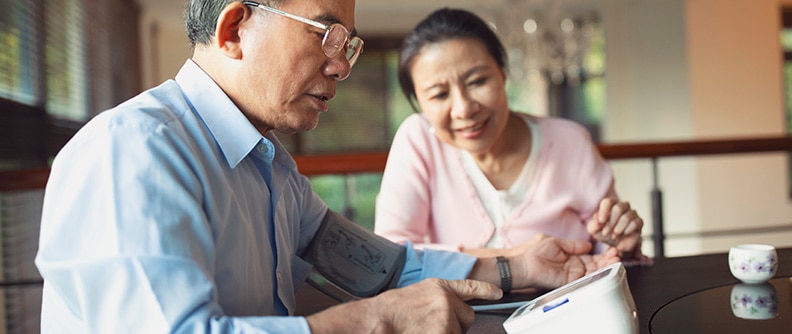 A man checks his blood pressure