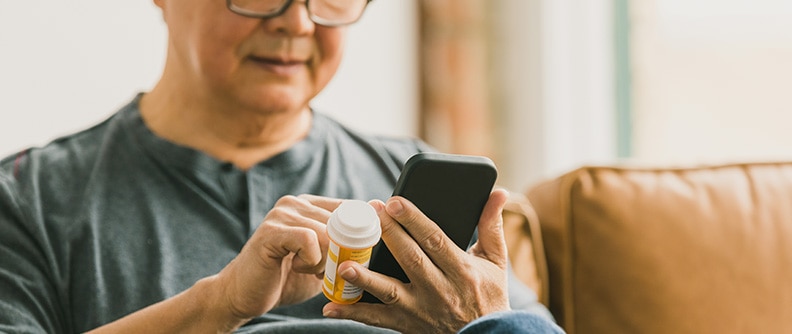 A man logs his medicines online