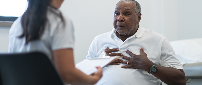 A man talks to his doctor