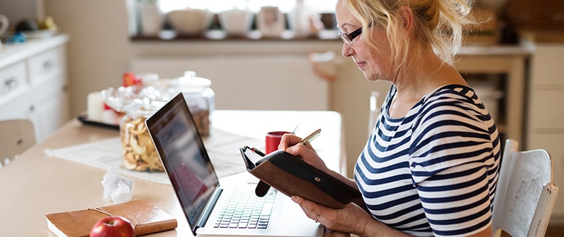 A woman checks her blood sugar results