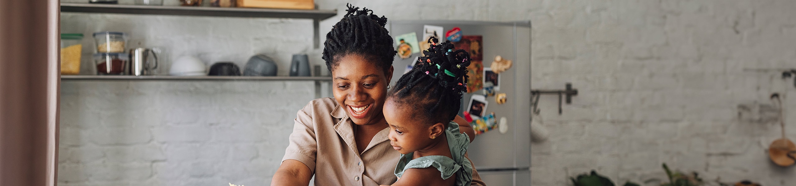 Mother and daughter in kitchen