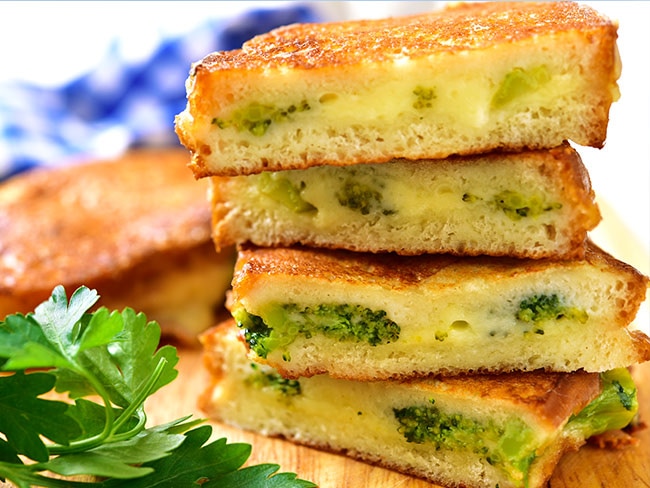 Grilled cheese with broccoli and spinach.