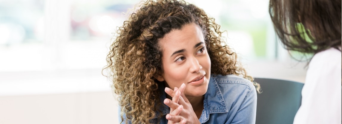woman talking to physician
