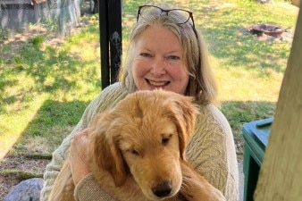 Maura Craig, from Portland, cuddles with a favorite friend, Louie.