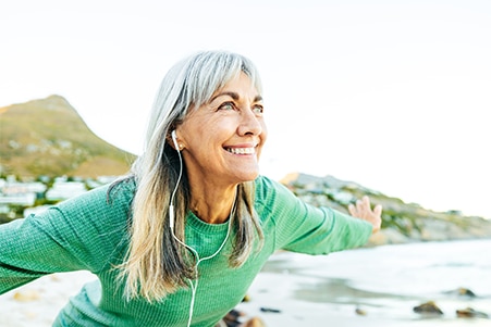 Older person exercising outside