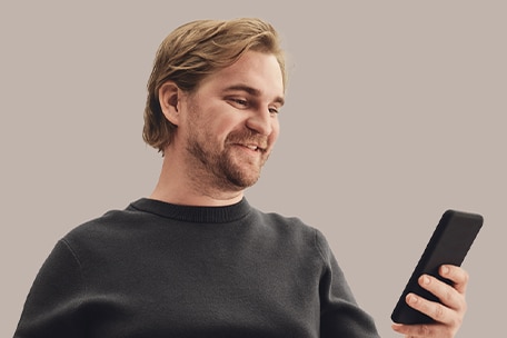 Person scheduling a visit on their phone