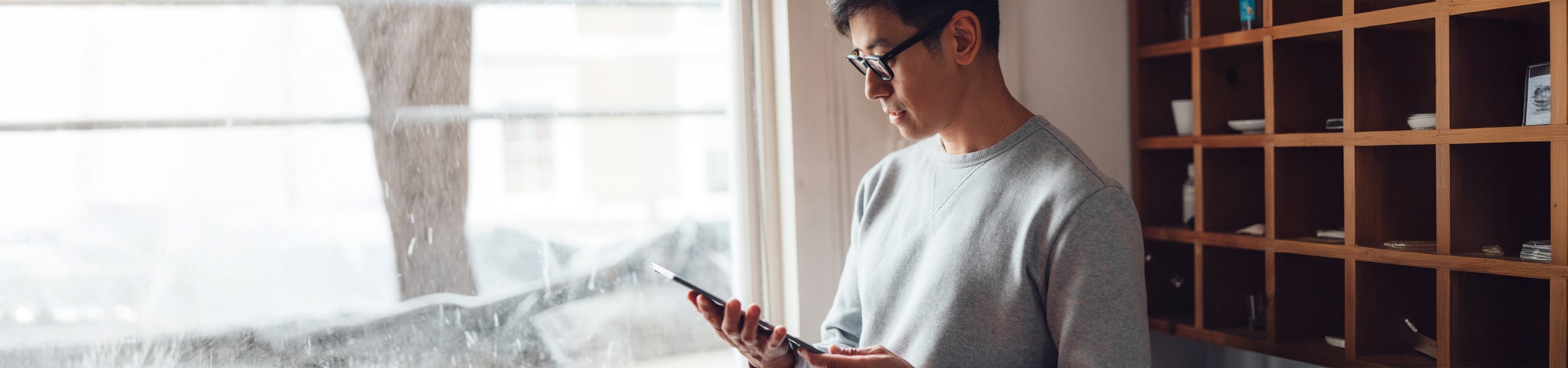 Person reading a tablet