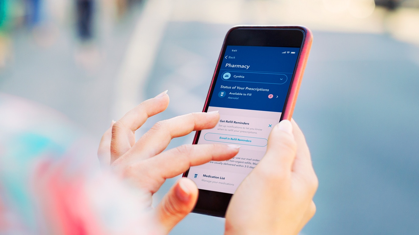 Person using the KP app on a smartphone