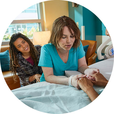 Doula helping a person in labor