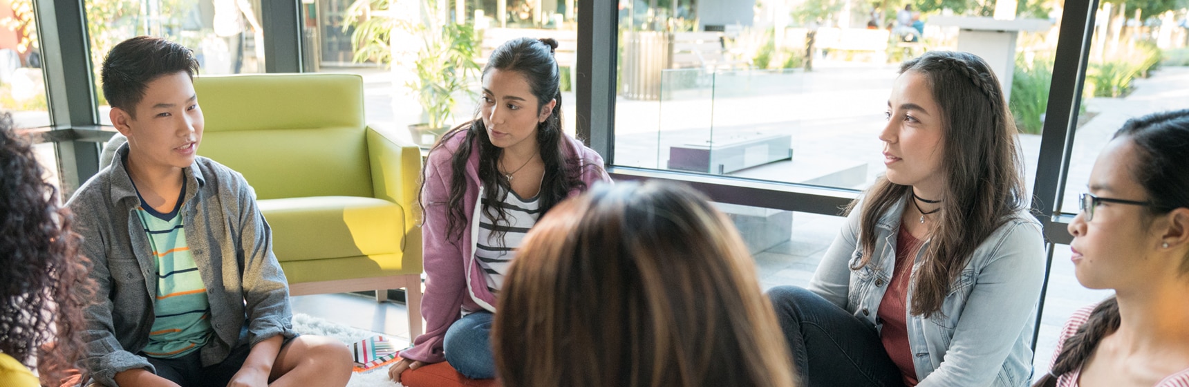 Group of young people having a conversation