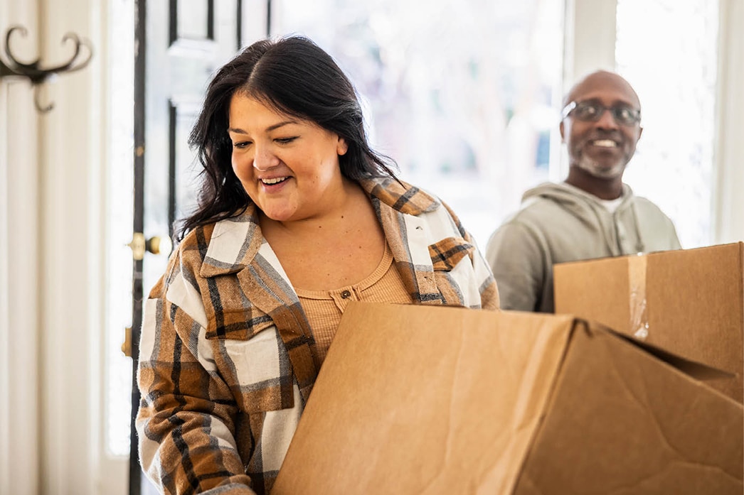 Couple moving into their new home