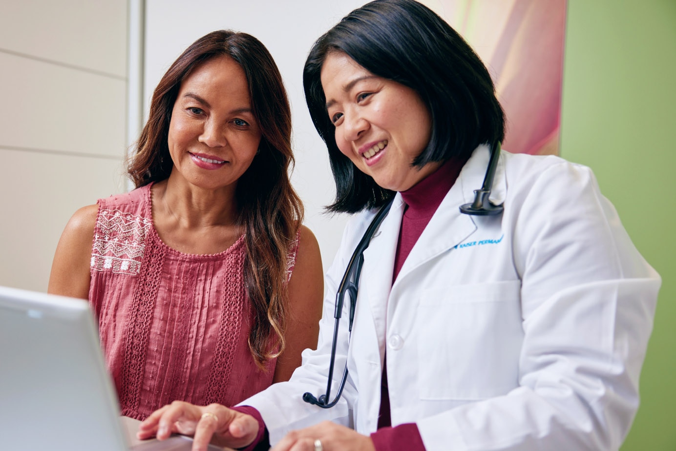 Doctor and patient reviewing the patient’s health record