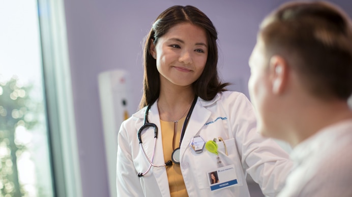 Doctor smiling at patient