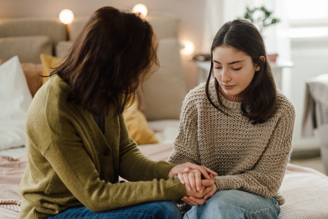 Parent talking with their teen