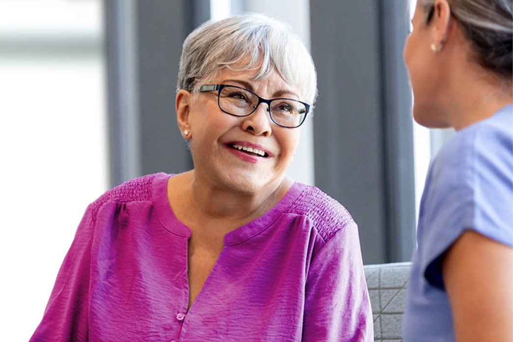 Person smiling at doctor