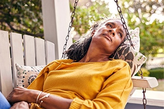 Person sitting back in a chair