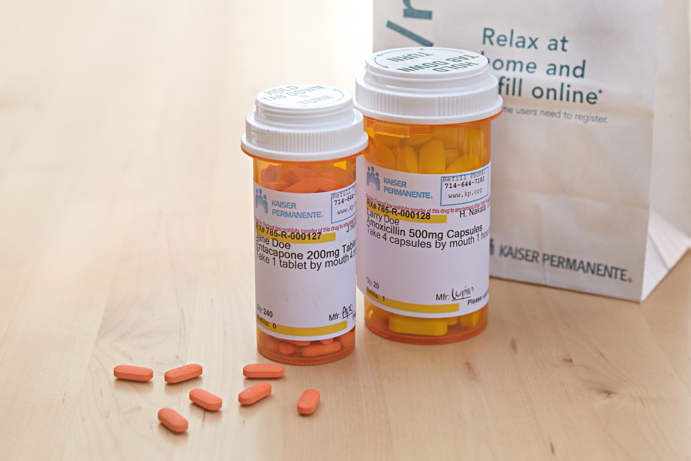 Prescription bottles and bag on a table