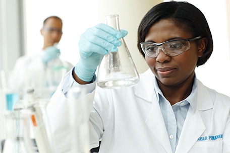 Doctor studying a solution in the lab