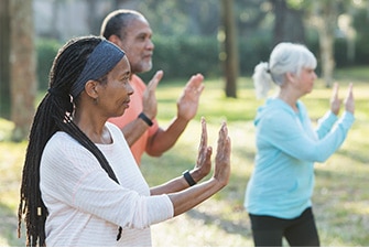 People exercising in park