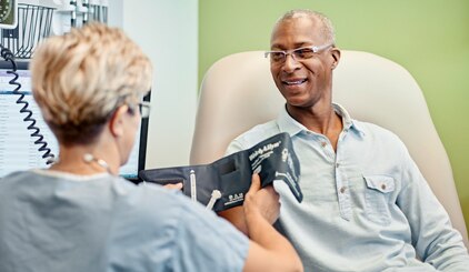 Patient getting blood pressure taken