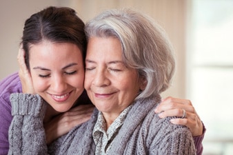 Person hugging parent