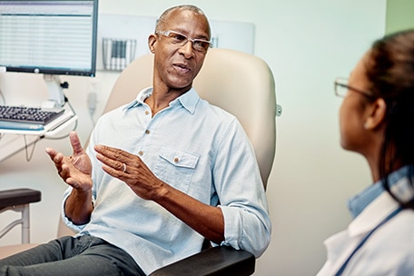 Patient talking to doctor
