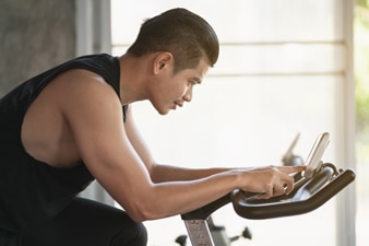 Person exercising on a stationary bike