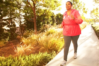 Person walking outdoors on a path