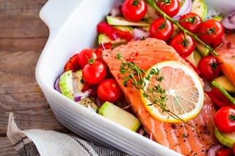 Salmon and vegetables in a baking dish