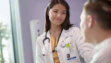 Doctor talking with her patient
