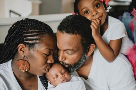 Alicia Saunders with her husband, David; daughter Zoe; and baby boy, Kody