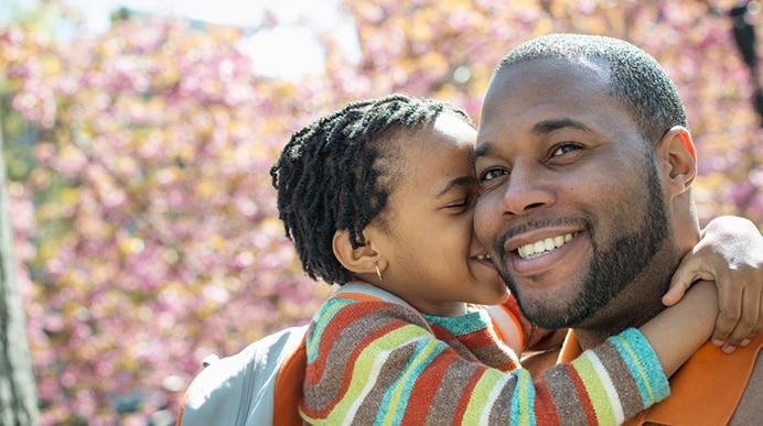 father and daughter hugging