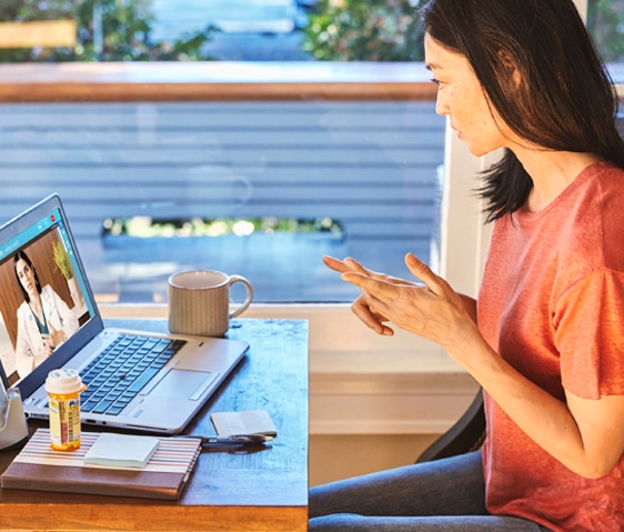 Person in a video conference with their doctor