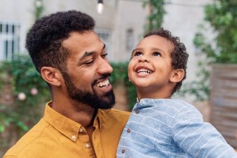 Smiling parent and child