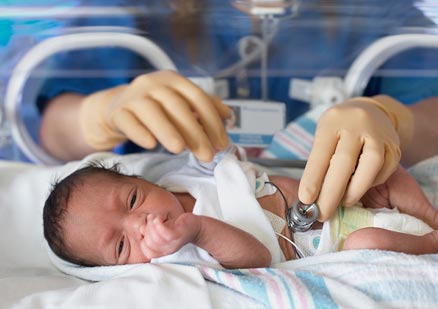 black premature babies in incubators