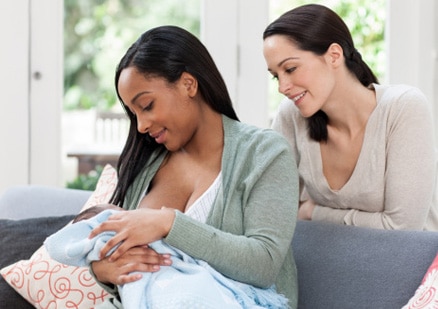 woman in breastfeeding position