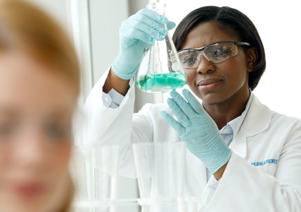 woman with doctor in a lab