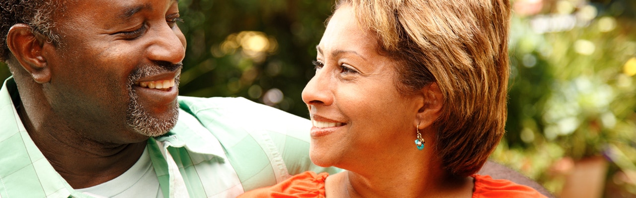 older African American couple happy together & smiling older African American couple happy together & smiling