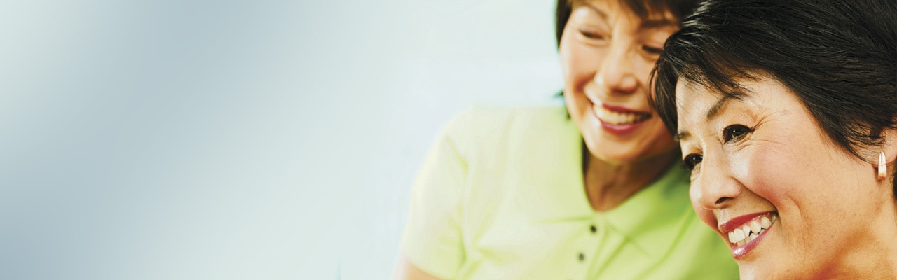 two older women happy in conversation