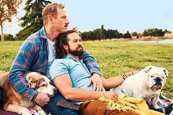 Couple laying in a field