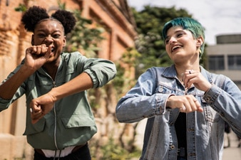  Two people smiling and dancing together