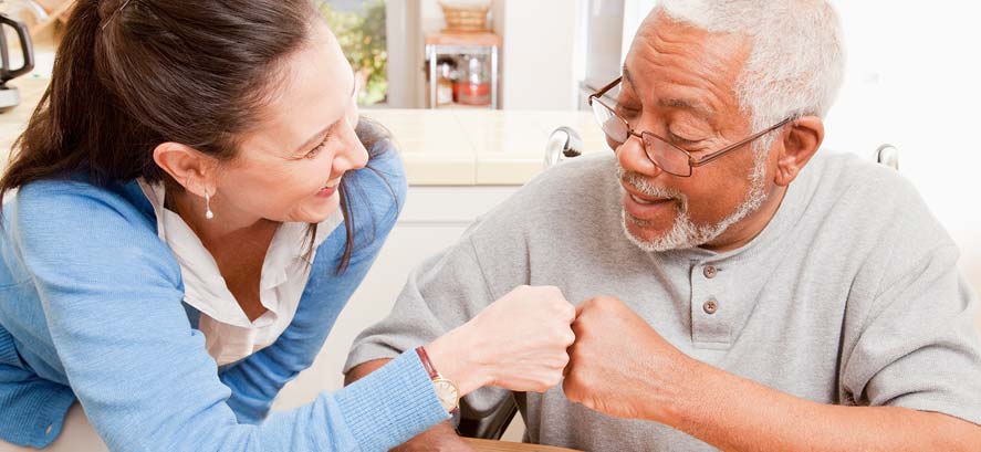 Provider and her patient bumping fists Provider and her patient bumping fists