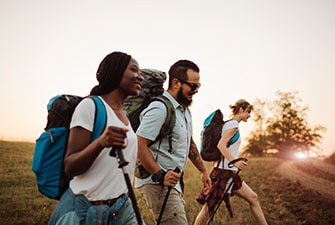 3 people enjoying a hike