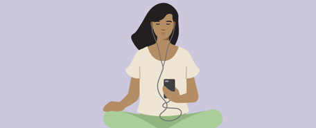 Person listening to their phone with headphones
