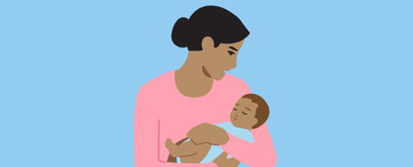 Parent cradling their baby