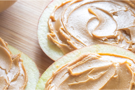 Apple slices topped with creamy peanut butter