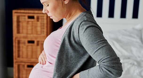 Pregnant person looking worried